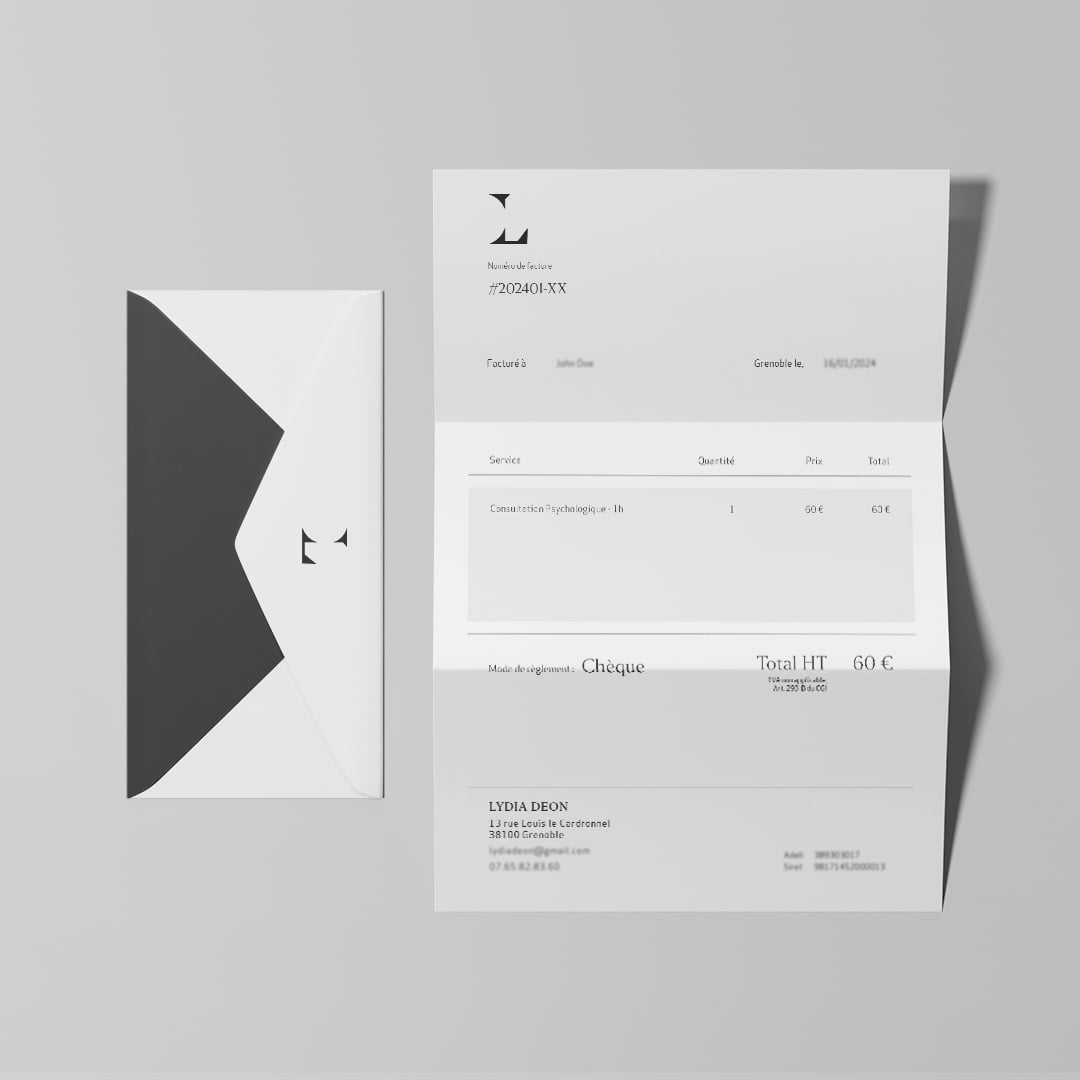 Letterhead-&-Envelope_LD Monogramme d'un L avec une version noire sur fond blanc et une version blanche sur fond noir.